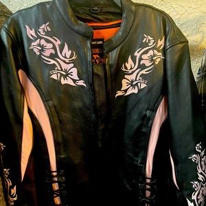 Women’s Harley leather riding jacket, size medium, never warn